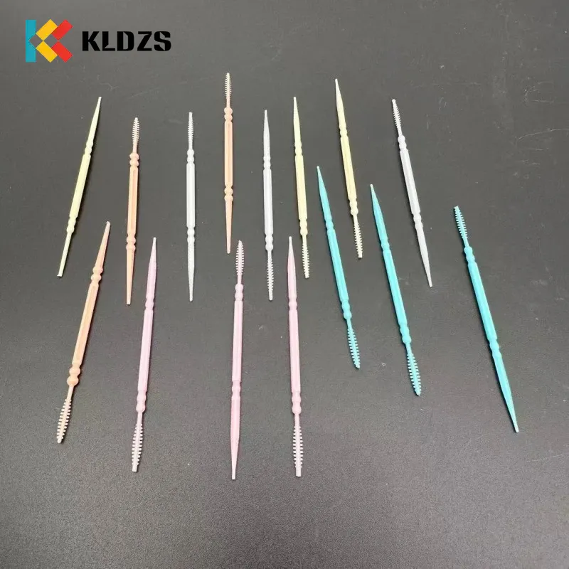 Žuvies kaulo formos plastikinis dantų krapštukas